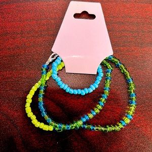 20 1/2in light blue and light green belly chains also with clear light colors